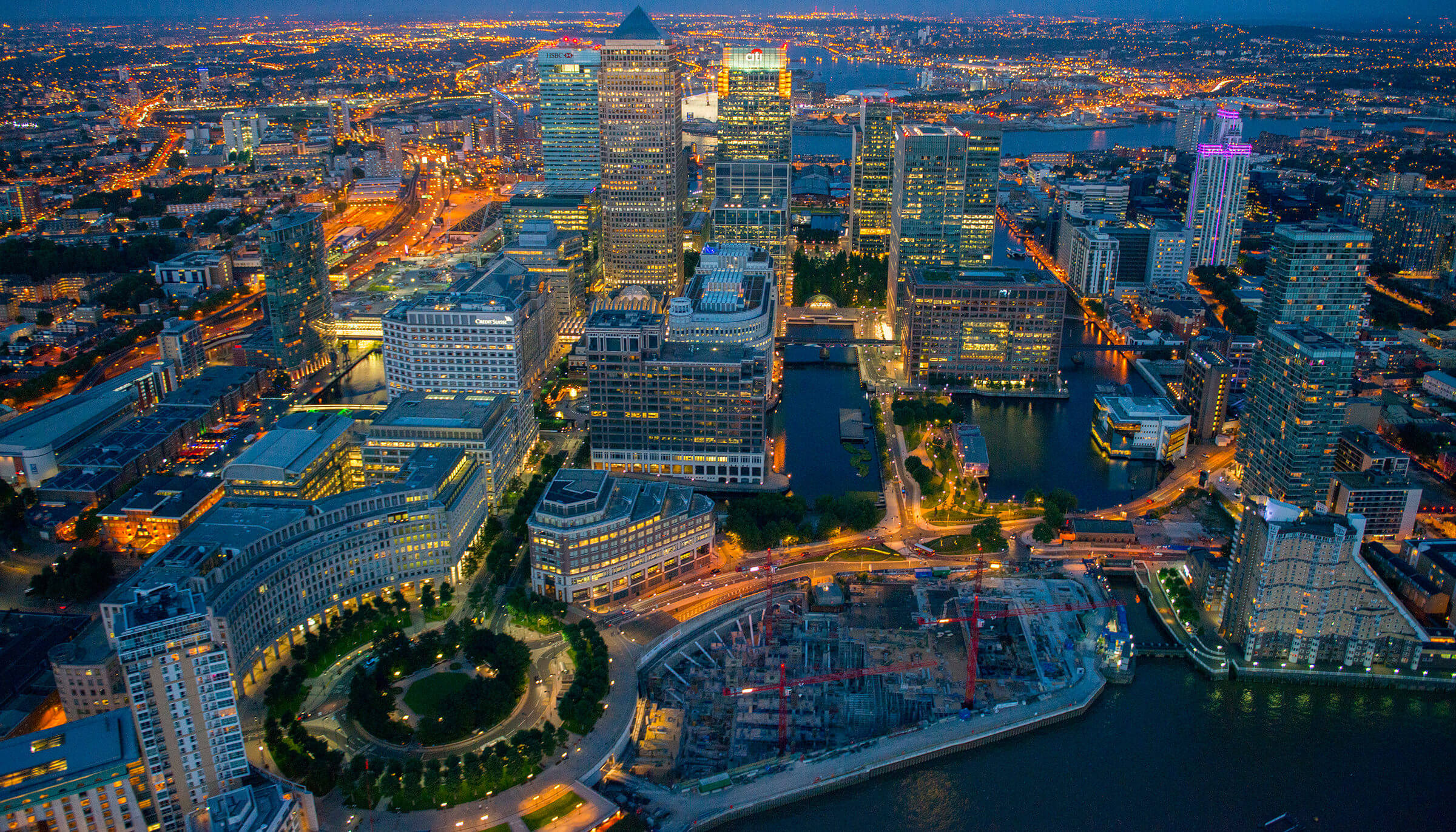 Aerial view of Westferry Circus and Canary Wharf at night, London